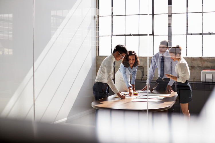 DOC_KC_PNG_Stock_people standing around desk working_resized DOC_KC_PNG_Stock_people standing around desk working_resized